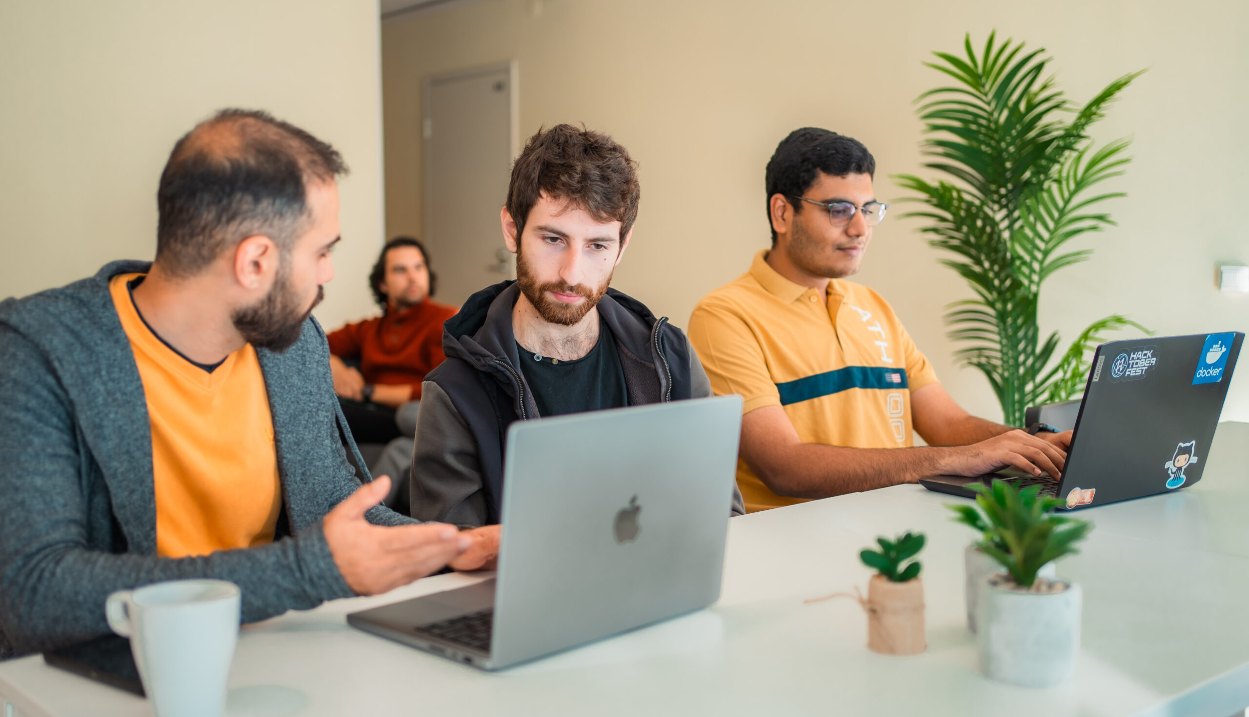 Students studying together in a shared living room, highlighting collaborative study spaces designed for international students in student accommodation